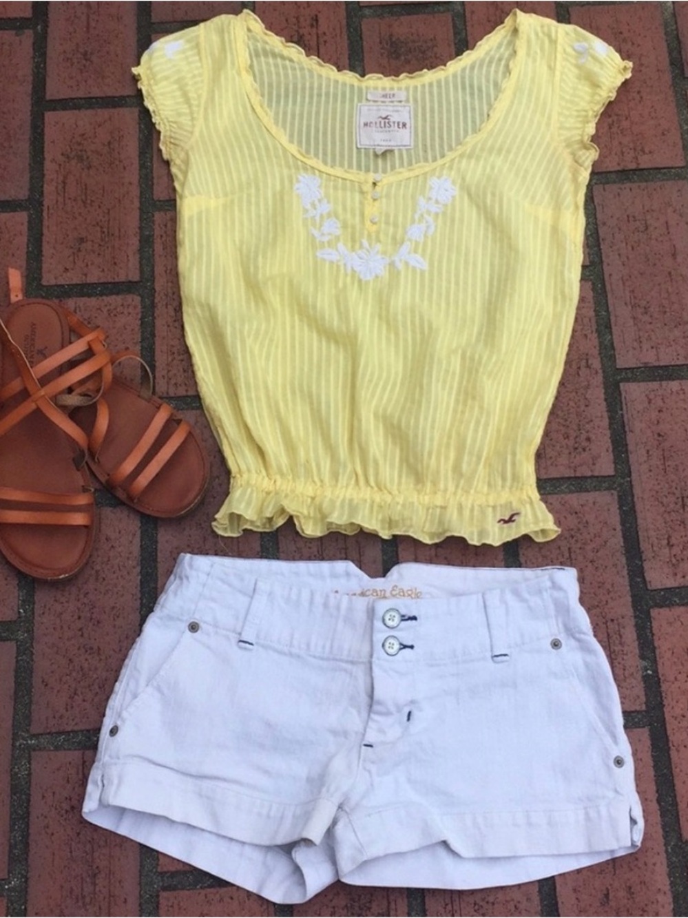 Sold: Hollister Yellow Short Sleeve Ruffle Hem Top with White Embroidery